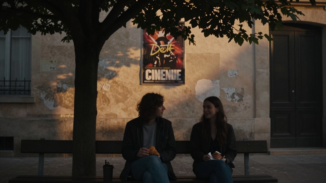 Two silhouettes sit quietly on a bench near the canal, sharing a moment without words.