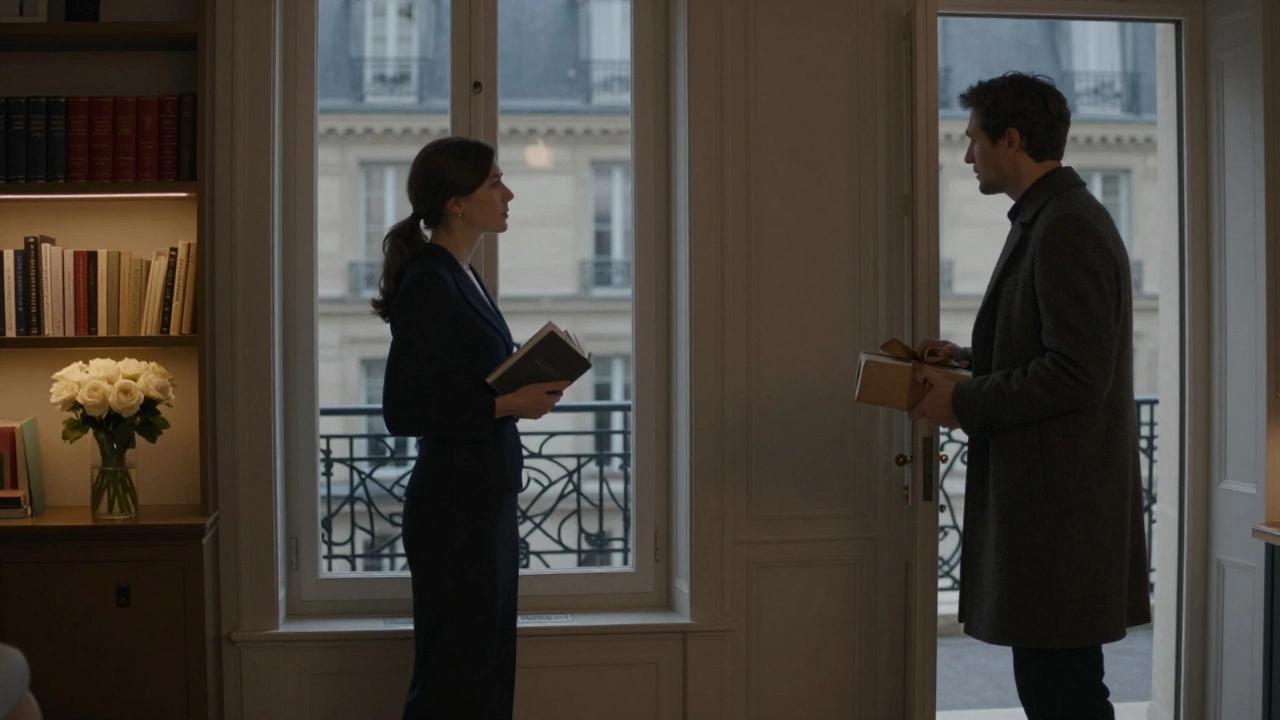 A sophisticated woman in a Parisian apartment welcomes a guest holding a small gift, soft light from the window.