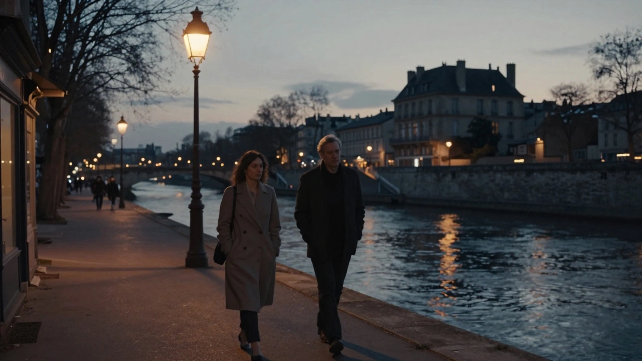 Two people walking peacefully along the Bièvre River at dusk in Paris's 13th arrondissement.